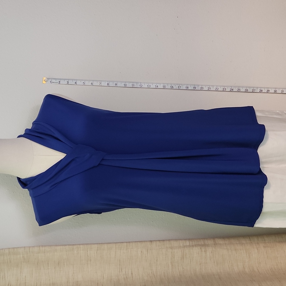 Women's top with faux scarf/tie.